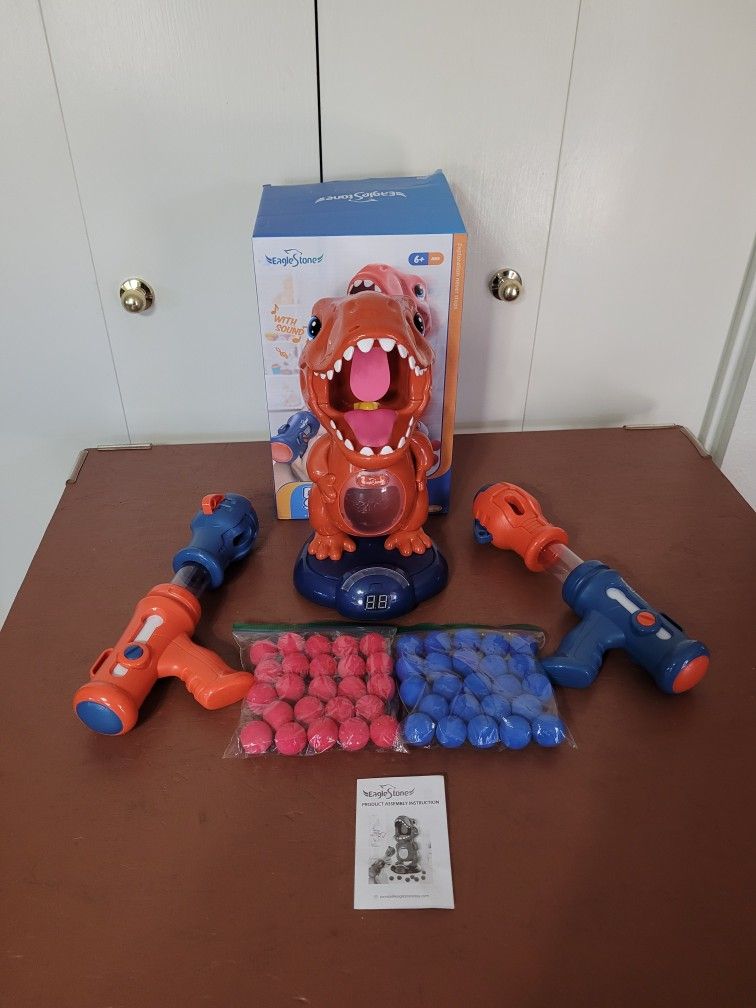 Eagle Stone Moveable Dinosaur Shooting Toy -- 2 Pump Guns & 48 Foam Balls -- PENDING PICKUP