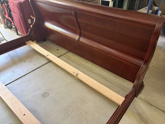 Dark and solid king bed frame and desk for sale.