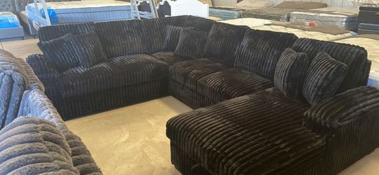 New Sofa sectional black color ready to deliver with a pullout bed