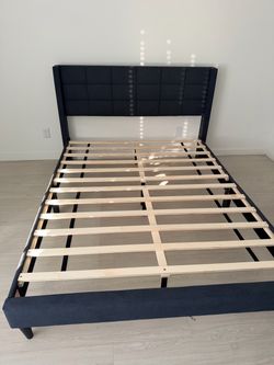 Queen size bed frame new in box