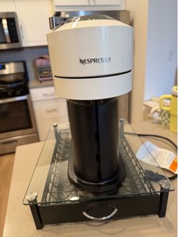 Nespresso coffee machine with pods drawer