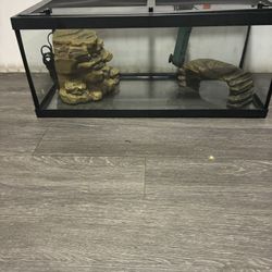 Fish /turtle aquarium with filter pump.Length 30” width 12”.