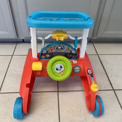 Fisher-Price 2-Sided Steady Speed Walker.