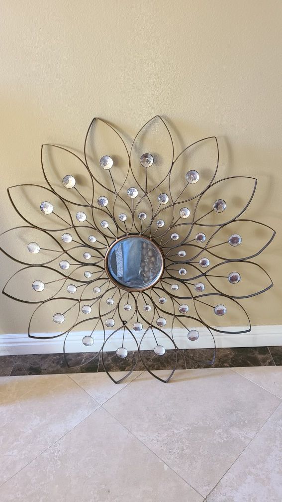 Metal wall art with Small mirror in middle