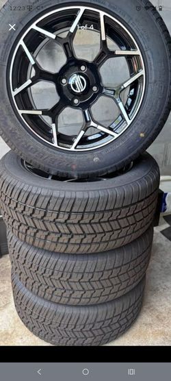Str 225 /50/ r 14   brand new rims and tires never put on a golf cart