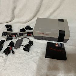 Super Nintendo Console And Super Mario Game 