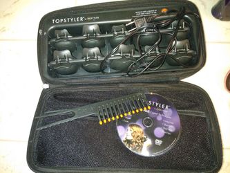 New instyler sea shell hair curlers with instructions dvd and comb. 30$