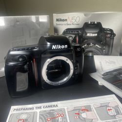 Nikon N50 (F50) — BRAND NEW OLD STOCK 1994 Nikon film SLR, never used, still in original box with everything!