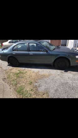 97 Nissan Maxima !!Does Not Run & no tittle!! Need gone bill of sale