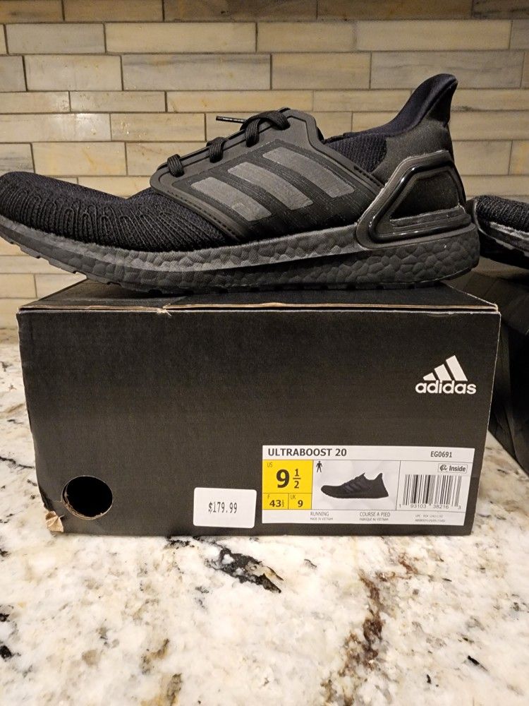 Three Ultraboost 20 black Size 9.5