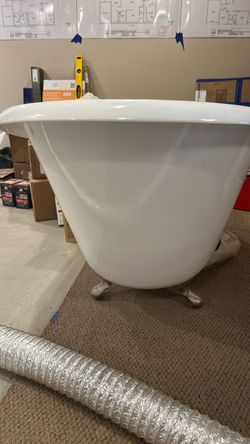 White Clawfoot Bathtub with Silver Feet