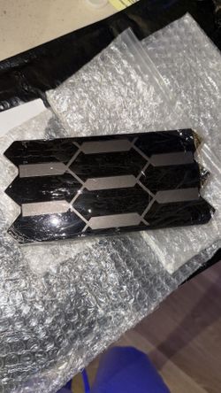 Sensor cover for a tacoma trd pro grill
