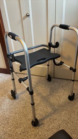 Walker with seat