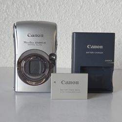 Canon PowerShot SD890 IS Digital ELPH Digital Camera W/ Charger & Battery *READ*