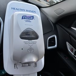Purell Industries standing floor automatic hand sanitizer dispenser
