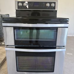 Whirlpool 6.7 cu. ft. 5 Burner Element Double Oven Electric Range with True Convection in Stainless Steel