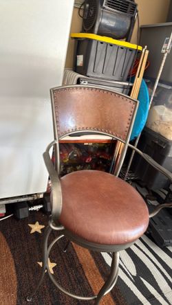 Pair of Artística Stamped Back Swivel Bar Stools