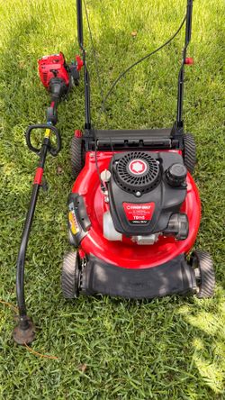 Troybilt bombo push mower and weed eater