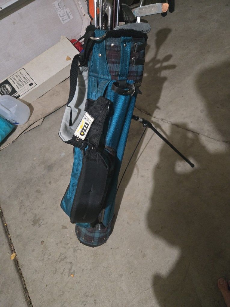 Golf Bag And Assortment Of Clubs