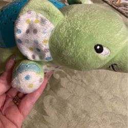 Swaddle Me -soother projector nightlight for Children with calming music & sounds