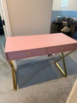 Pink and gold desk