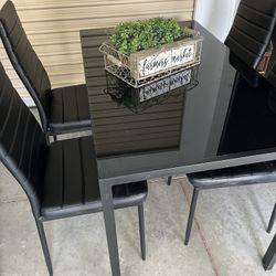 Table And 4 Chairs 
