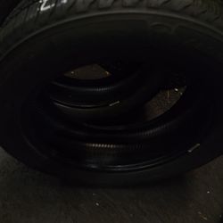 2 Tires 215.55.17 Firestone All Season 99 % TREAD DOT 4222