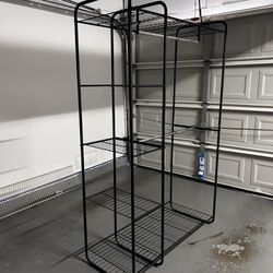 Clothes rack with shelves