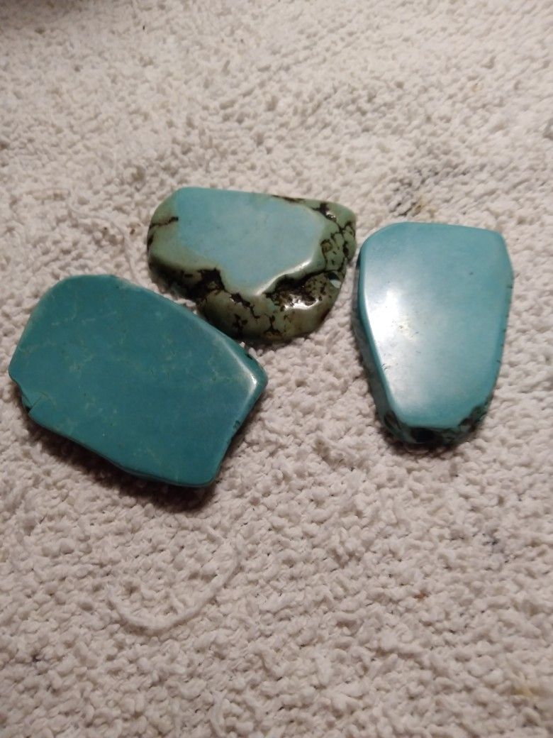 3 REAL NICE PEICES OF TURQUOISE. 1 1/2. X. 2" CLOSE. TO SIZE 200.00 ALL 3 PEICES