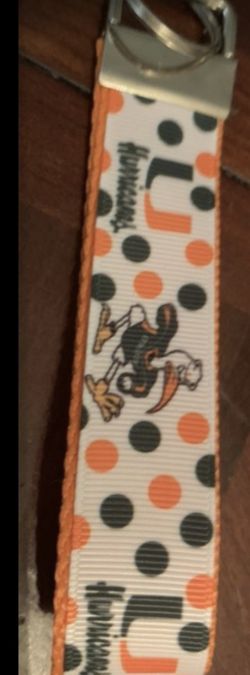 Two key fobs one u of m and one Marduk Gras