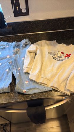 Hello kitty jeans and sweatshirt girls size 7/8