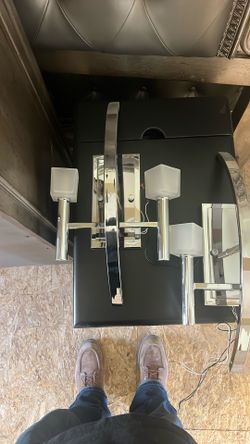 Bathroom Vanity Lights, Tub Filler, Chandelier And A Rain Head Shower Head.