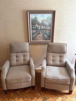 Matching Pair of Beige Tufted Recliner Armchairs