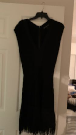 Black dress with fringes on the bottom