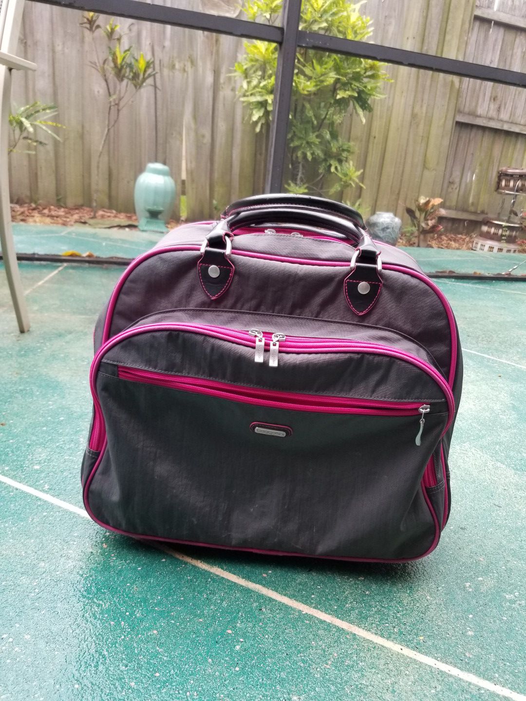 Baggalini rolling tote bag - carryon travel organizer.
