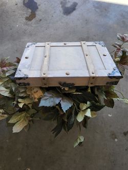 Decorative Chest With Flower Arrangement