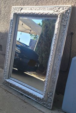 Ornate Silver wood mirror