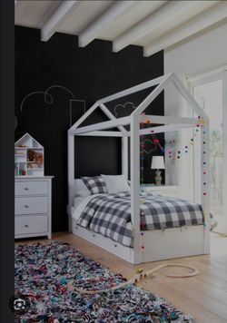 Kids white bedroom with canopy