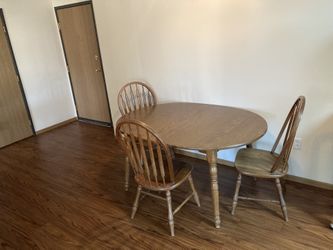 49”X60” Table 3 Chairs Good Condition