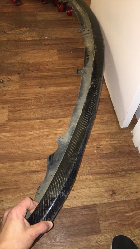 Acura TSX 04 carbon fiber bumper lip (has cracked on bottom of the lip)