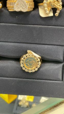 Coin gold ring.