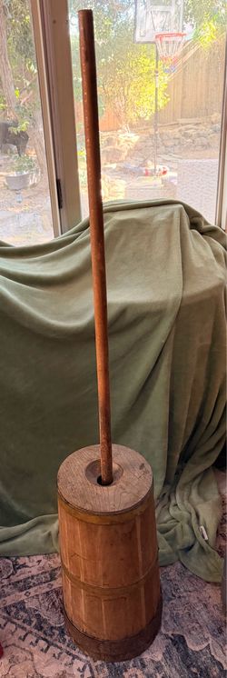 This appears to be a vintage staved wooden butter churn, consistent with 19th-century American primitive designs.