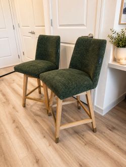 Two swivel Green Bar Stools both for $265!