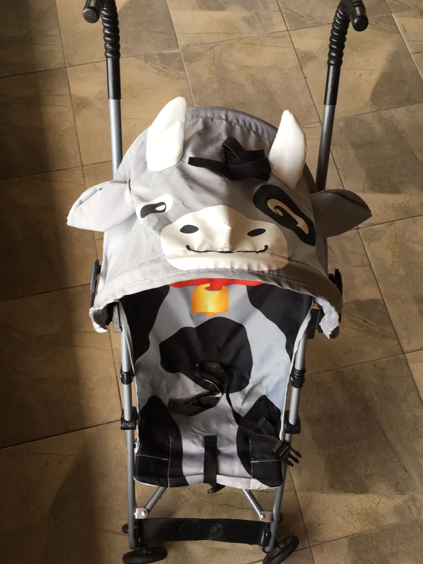 Umbrella stroller cow great condition