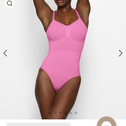 SKIMS bodysuit hot pink size L/XL for Sale in Sacramento, CA