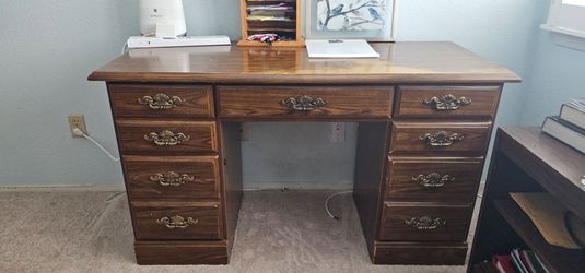 7 drawer desk 52" long wood wih.brass handled