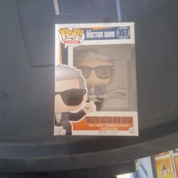 The Twelfth Doctor With Guitar Pop Vinyl