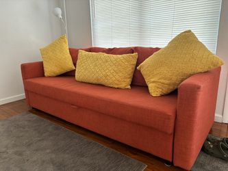 Beautiful Peach/Coral Semi used BED SOFA 