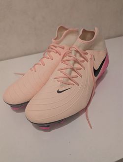 Brand new-Nike Phantom Luna 2 Academy soccer cleats in a Crimson Tint and Pink Blast colorway