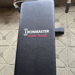 Iron Master Super Adjusting Weight Bench And Weights
